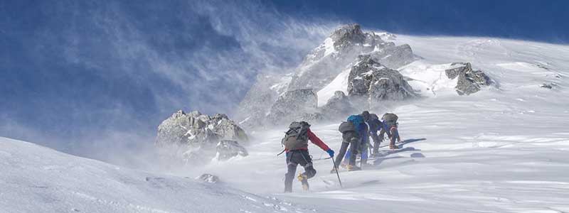 mountain climbing crew snow difficult